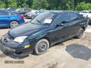 2006 Ford Focus S with VIN 1FAFP34N76W233950, listed as a IAAI auction lot 42596698 with 262,504 mi miles and . Bid and sale history available at DreamBid. Image 2.