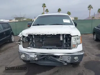 2013 Ford F-150 XL with VIN 1FTFW1ET7DKD70468, listed as a IAAI auction lot 40952588 with 208,052 mi miles. Bid and sale history available at carsss.com. Image 12.
