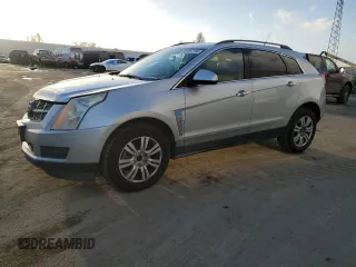2012 Cadillac SRX with VIN 3GYFNGE32CS541047, listed as a Copart auction lot 87357794 with 144,135 mi miles and Salvage Title. Bid and sale history available at carsss.com. Image 1.