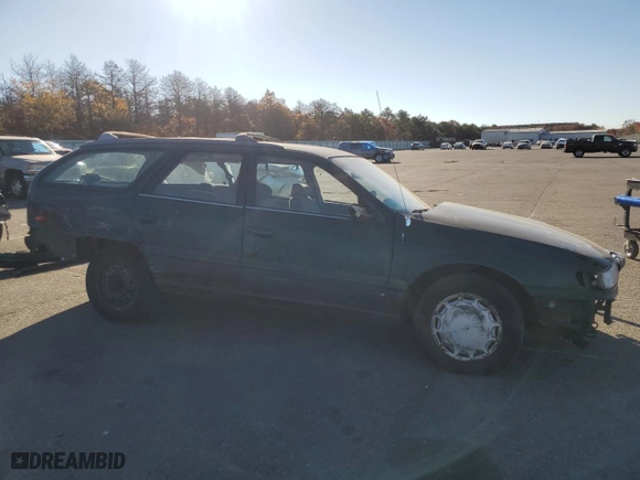 1994 Ford Taurus GL with VIN 1FALP57U8RG288147, listed as a Copart auction lot 84584784 with 154,187 mi miles and Non Repairable. Bid and sale history available at carsss.com. Image 4.