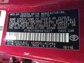 2019 Toyota Avalon Hybrid Limited with VIN 4T1B21FB8KU010221, listed as a IAAI auction lot 41470592 with 100,869 mi miles. Bid and sale history available at carsss.com. Image 9.