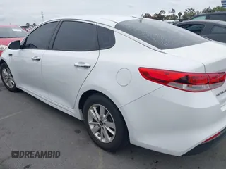 2016 Kia Optima LX with VIN 5XXGT4L32GG047624, listed as a IAAI auction lot 42068219 with 114,316 mi miles. Bid and sale history available at carsss.com. Image 14.