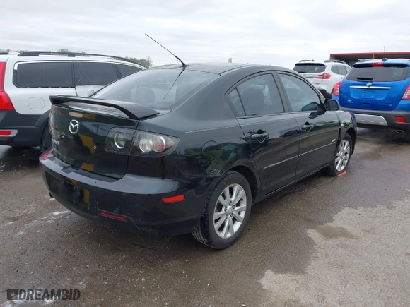2007 Mazda Mazda3 s Touring with VIN JM1BK323571640804, listed as a IAAI auction lot 41913603 with 134,147 mi miles. Bid and sale history available at carsss.com. Image 4.