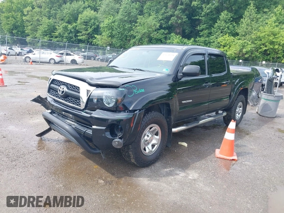 2011 Toyota Tacoma with VIN 3TMLU4EN9BM058136, listed as a IAAI auction lot 42470638 with 143,074 mi miles and . Bid and sale history available at DreamBid. Image 2.