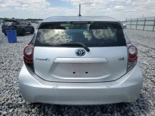 2014 Toyota Prius One with VIN JTDKDTB38E1566009, listed as a Copart auction lot 53540585 with 104,605 mi miles and Salvage Title. Bid and sale history available at DreamBid. Image 6.
