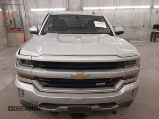 2017 Chevrolet Silverado 1500 LT with VIN 3GCUKREC5HG318772, listed as a IAAI auction lot 42056116 with 82,987 mi miles and . Bid and sale history available at DreamBid. Image 13.