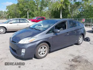 2011 Toyota Prius I with VIN JTDKN3DUXB1404431, listed as a IAAI auction lot 42045275 with 101,293 mi miles. Bid and sale history available at carsss.com. Image 2.