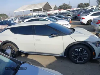 2024 Kia EV6 Wind with VIN KNDC3DLC9R5615468, listed as a IAAI auction lot 41459807 with 22,159 mi miles. Bid and sale history available at carsss.com. Image 13.