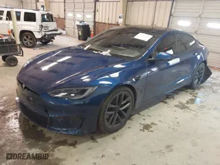 2021 Tesla Model S Plaid with VIN 5YJSA1E6XMF439884, listed as a IAAI auction lot 41622750 with 1 mi miles. Bid and sale history available at carsss.com. Image 2.