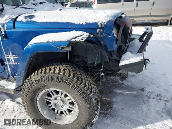 2010 Jeep Wrangler Sahara z VIN 1J4AA5D18AL170957, wystawiony jako IAAI lot #41599820 z przebiegiem 64 217 mil mil oraz . Historia ofert i sprzedaży dostępna na DreamBid. Obrazek 6.