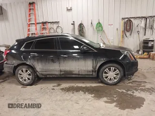 2014 Cadillac SRX Luxury Collection with VIN 3GYFNBE38ES518247, listed as a IAAI auction lot 41475294 with Not Provided miles and . Bid and sale history available at carsss.com. Image 13.
