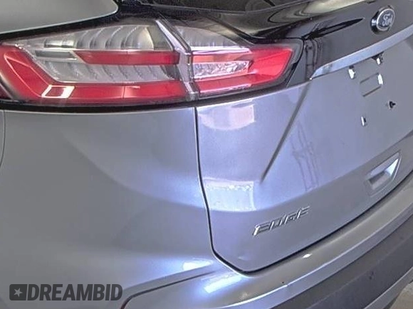 2020 Ford Edge Titanium z VIN 2FMPK4K91LBA91290, wystawiony jako IAAI lot #42494043 z przebiegiem 71 254 mil mil oraz . Historia ofert i sprzedaży dostępna na DreamBid. Obrazek 11.