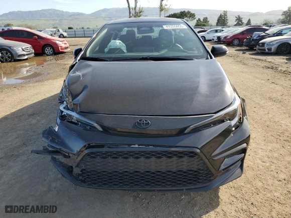 2024 Toyota Corolla SE with VIN 5YFS4MCE7RP210092, listed as a Copart auction lot 49355055 with 8,595 mi miles and Salvage Title. Bid and sale history available at carsss.com. Image 5.