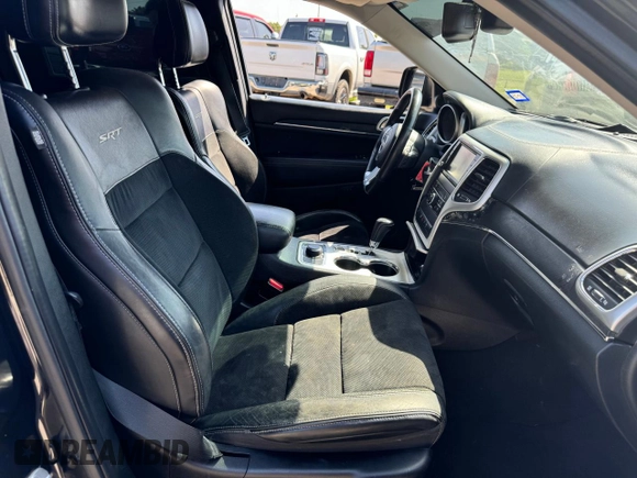 2012 Jeep Grand Cherokee SRT8 with VIN 1C4RJFDJ2CC111226, listed as a Copart auction lot 74449424 with 113,515 mi miles and Clean Title. Bid and sale history available at carsss.com. Image 5.