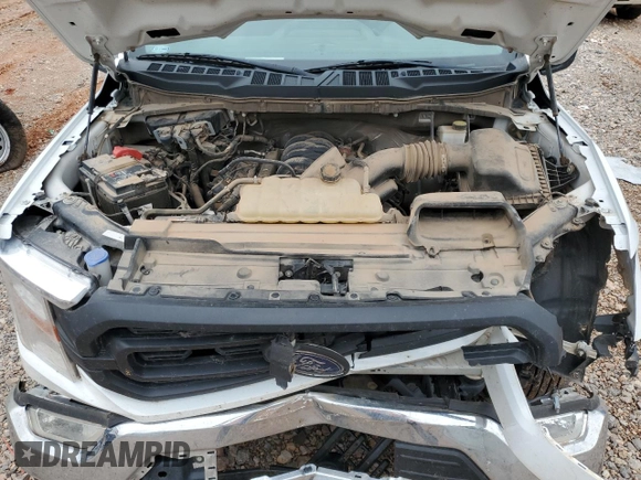 2021 Ford F-150 XL z VIN 1FTMF1C56MKE99832, wystawiony jako Copart lot #58199975 z przebiegiem 86 532 mil mil oraz Szkoda całkowita • Salvage title. Historia ofert i sprzedaży dostępna na DreamBid. Obrazek 11.