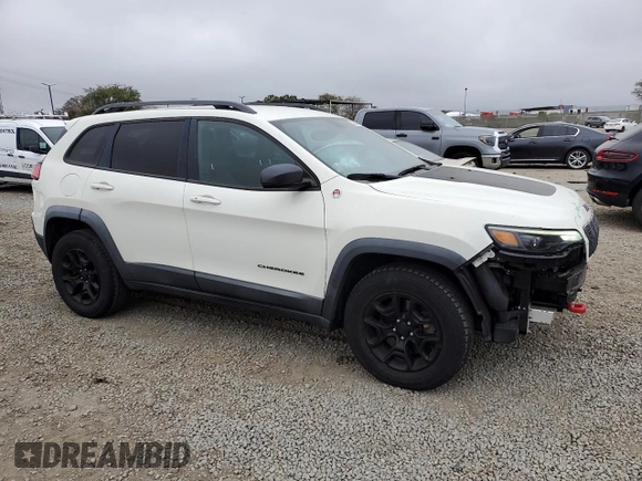 2019 Jeep Cherokee Trailhawk z VIN 1C4PJMBX0KD127324, wystawiony jako Copart lot #50821445 z przebiegiem 88 604 mil mil oraz Szkoda całkowita • Salvage title. Historia ofert i sprzedaży dostępna na DreamBid. Obrazek 4.