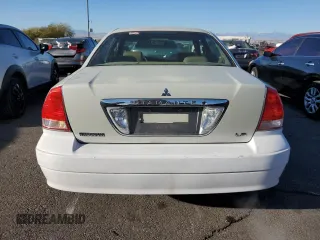 2002 Mitsubishi Diamante LS z VIN 6MMAP67P02T011531, wystawiony jako Copart lot #83510334 z przebiegiem 106 482 mil mil oraz Szkody całkowita. Historia ofert i sprzedaży dostępna na DreamBid. Obrazek 6.