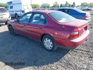 1995 Honda Accord LX with VIN JHMCD5634SC060105, listed as a IAAI auction lot 42111394 with 217,635 mi miles and . Bid and sale history available at carsss.com. Image 3.