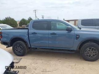 2024 Ford Ranger XLT z VIN 1FTER4GH6RLE43313, wystawiony jako IAAI lot #42315477 z przebiegiem 7 175 mil mil oraz . Historia ofert i sprzedaży dostępna na DreamBid. Obrazek 12.