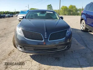 2014 Lincoln MKS EcoBoost z VIN 1LNHL9FT8EG607807, wystawiony jako Copart lot #57755915 z przebiegiem 203 316 mil mil oraz Szkoda całkowita • Salvage title. Historia ofert i sprzedaży dostępna na DreamBid. Obrazek 5.