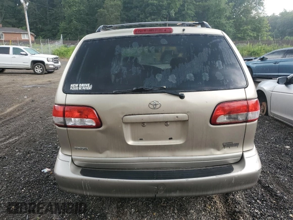 2003 Toyota Sienna LE with VIN 4T3ZF13C33U540296, listed as a Copart auction lot 62643745 with 143,727 mi miles and Salvage title. Bid and sale history available at DreamBid. Image 7.