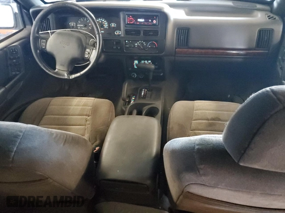 1997 Jeep Grand Cherokee Laredo with VIN 1J4GZ58SXVC723703, listed as a Copart auction lot 89216845 with 247,398 mi miles and Clean Title. Bid and sale history available at carsss.com. Image 8.