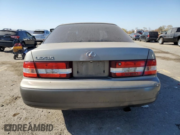 2000 Lexus ES 300 with VIN JT8BF28GXY5091263, listed as a Copart auction lot 61767595 with 250,041 mi miles and Salvage title. Bid and sale history available at DreamBid. Image 6.