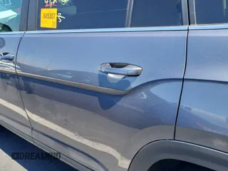 2023 Volkswagen Atlas SE z VIN 1V2HR2CA5PC526012, wystawiony jako IAAI lot #42796408 z przebiegiem 41 216 mil mil oraz . Historia ofert i sprzedaży dostępna na DreamBid. Obrazek 10.