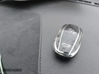 2015 Tesla Model S 85D with VIN 5YJSA1E25FF107819, listed as a IAAI auction lot 41333556 with 141,066 mi miles. Bid and sale history available at carsss.com. Image 11.