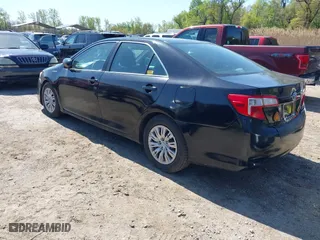 2014 Toyota Camry Hybrid LE with VIN 4T1BD1FK5EU131433, listed as a IAAI auction lot 42069399 with 51,046 mi miles. Bid and sale history available at carsss.com. Image 3.