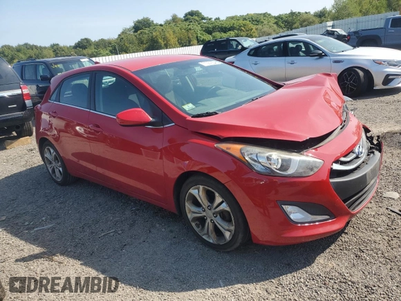 2013 Hyundai Elantra GT with VIN KMHD35LE4DU082855, listed as a Copart auction lot 71051354 with 127,040 mi miles and Salvage Title. Bid and sale history available at carsss.com. Image 4.