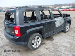 2014 Jeep Patriot Latitude with VIN 1C4NJRFBXED761411, listed as a IAAI auction lot 41914086 with Not Provided miles. Bid and sale history available at carsss.com. Image 4.