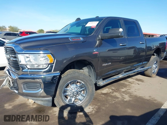 2019 Ram 2500 Big Horn with VIN 3C6UR5DL3KG519364, listed as a IAAI auction lot 41582163 with 21,881 mi miles and . Bid and sale history available at DreamBid. Image 2.