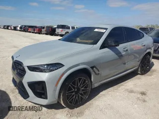 2024 BMW X6 M with VIN 5YM23ET04R9S28947, listed as a Copart auction lot 77666914 with 21,814 mi miles and Non Repairable. Bid and sale history available at carsss.com. Image 1.