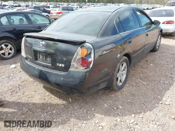 2003 Nissan Altima S with VIN 1N4AL11D03C165042, listed as a IAAI auction lot 41888473 with 306,629 mi miles. Bid and sale history available at carsss.com. Image 6.
