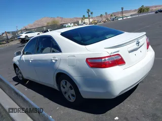 2007 Toyota Camry CE with VIN JTNBE46K473111827, listed as a IAAI auction lot 41872683 with 173,058 mi miles. Bid and sale history available at carsss.com. Image 3.