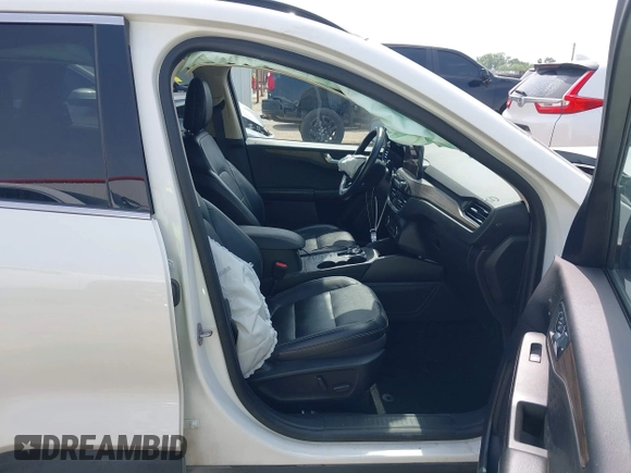 2020 Ford Escape Titanium Hybrid with VIN 1FMCU0DZ9LUA54867, listed as a IAAI auction lot 42268245 with 68,974 mi miles and . Bid and sale history available at DreamBid. Image 5.
