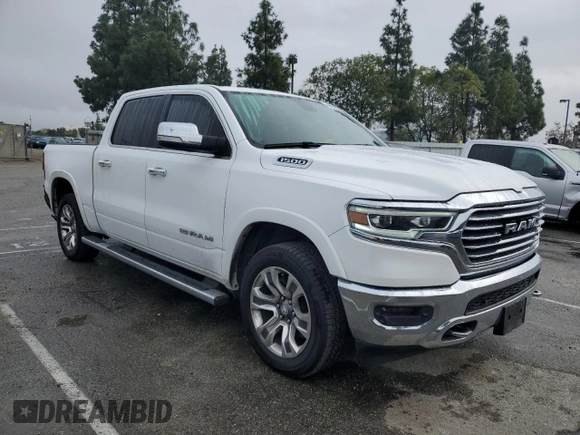 2020 Ram 1500 with VIN 1C6RREKG4LN401571, listed as a Copart auction lot 43620245 with 99,979 mi miles and Salvage title. Bid and sale history available at DreamBid. Image 4.