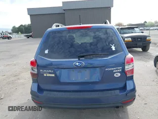 2014 Subaru Forester Premium z VIN JF2SJADC0EH551474, wystawiony jako IAAI lot #41977613 z przebiegiem 62 979 mil mil oraz . Historia ofert i sprzedaży dostępna na DreamBid. Obrazek 17.