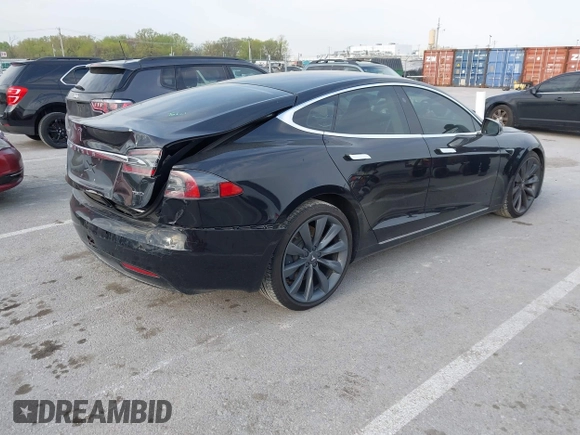 2017 Tesla Model S 100D with VIN 5YJSA1E28HF188981, listed as a IAAI auction lot 42010115 with 76,327 mi miles and . Bid and sale history available at DreamBid. Image 4.