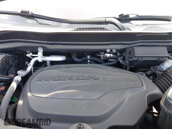 2021 Honda Pilot EX-L with VIN 5FNYF6H57MB064595, listed as a IAAI auction lot 41942327 with 46,150 mi miles and . Bid and sale history available at DreamBid. Image 10.