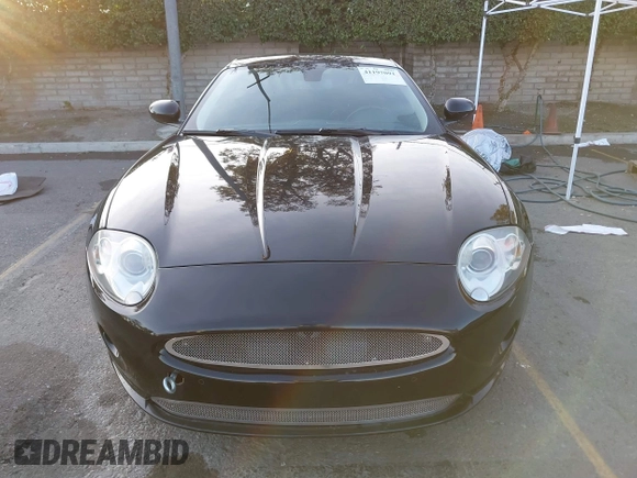 2008 Jaguar XK with VIN SAJWA43B985B23987, listed as a IAAI auction lot 41197091 with 54,803 mi miles. Bid and sale history available at carsss.com. Image 12.