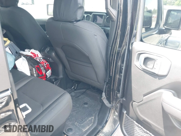 2023 Jeep Gladiator Sport S with VIN 1C6HJTAGXPL543319, listed as a IAAI auction lot 42499587 with 45,140 mi miles and . Bid and sale history available at DreamBid. Image 8.