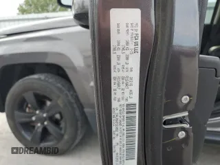 2015 Jeep Patriot Altitude Edition with VIN 1C4NJPBA2FD210652, listed as a Copart auction lot 53297605 with 142,759 mi miles and Salvage Title. Bid and sale history available at carsss.com. Image 14.
