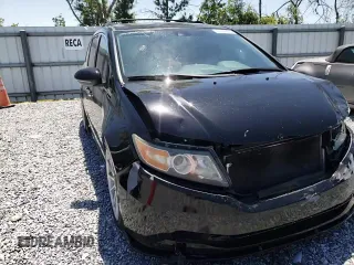 2014 Honda Odyssey Touring with VIN 5FNRL5H97EB016624, listed as a Copart auction lot 53444645 with 244,126 mi miles and Salvage Title. Bid and sale history available at DreamBid. Image 12.