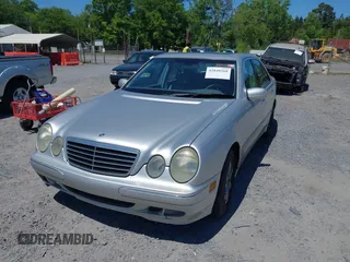 2002 Mercedes-Benz E-Class with VIN WDBJF65J72B441380, listed as a IAAI auction lot 42040268 with 210,471 mi miles. Bid and sale history available at carsss.com. Image 2.