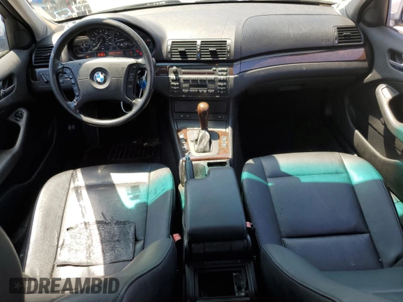 2003 BMW 3 Series 325i with VIN WBAAZ334X3PH33503, listed as a Copart auction lot 65090995 with 198,603 mi miles and Clean title. Bid and sale history available at DreamBid. Image 8.