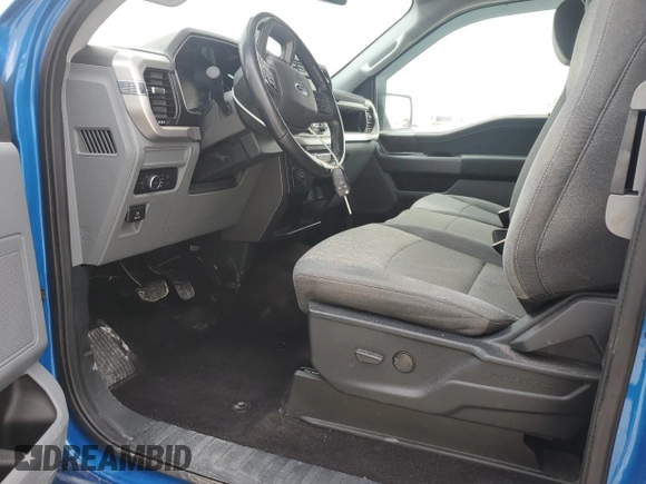 2021 Ford F-150 XL with VIN 1FTFX1E82MKE64671, listed as a Copart auction lot 51819705 with 34,913 mi miles and Salvage title. Bid and sale history available at DreamBid. Image 7.