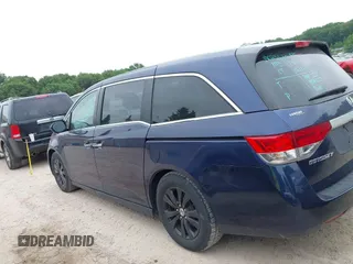 2015 Honda Odyssey EX-L z VIN 5FNRL5H68FB070392, wystawiony jako IAAI lot #42412403 z przebiegiem 146 907 mil mil oraz . Historia ofert i sprzedaży dostępna na DreamBid. Obrazek 14.