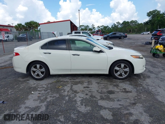 2009 Acura TSX with VIN JH4CU26649C018276, listed as a IAAI auction lot 42469738 with 130,961 mi miles and . Bid and sale history available at DreamBid. Image 13.